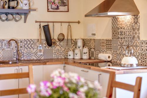 a kitchen with a sink and a counter top at Casa Martin in Calvià