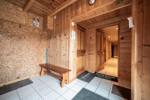 a wooden room with a wooden bench in it at Sherpa - 10 pers in Saint-Jean-d'Aulps