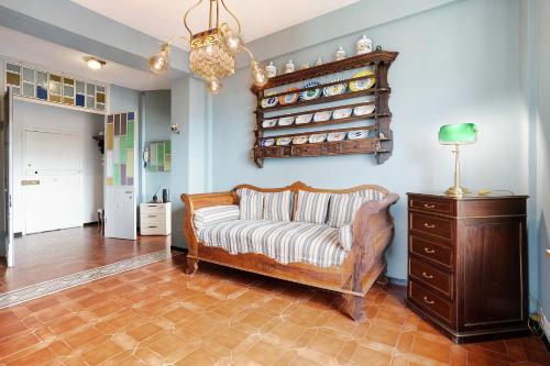 a living room with a couch and a table at 5 Terre - Lerici - Aless View in Lerici