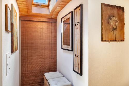 a bathroom with a walk in shower with a toilet at Ferienwohnungen St Christoph in Mittenwald