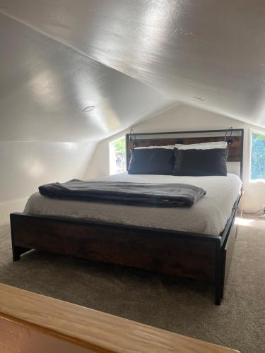 a bedroom with a large bed in a tent at Rustic Ridge in Granite Dells in Prescott