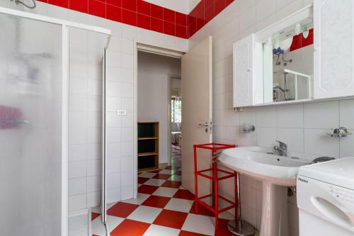 a bathroom with a sink and a shower at Villa Cinzia in Torre Lapillo