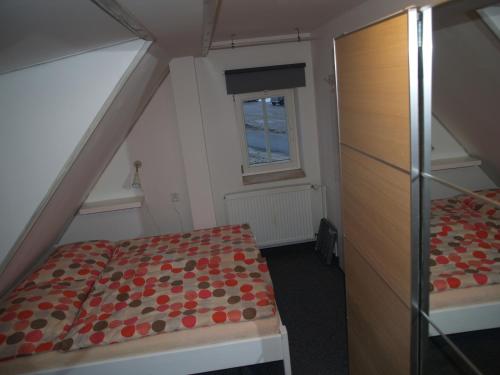 Cama o camas de una habitación en Chata Mísečky