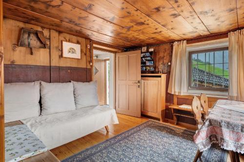 a living room with a couch and a table at Ferienhaus Leitner in Tires