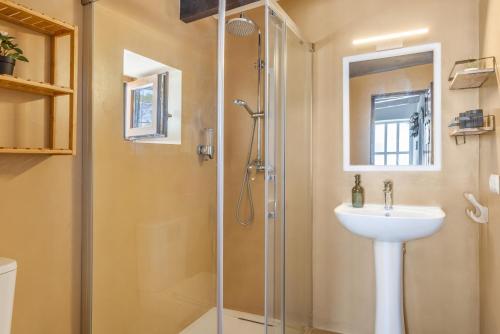 a bathroom with a shower and a sink at Can Vital 2 in Illes Balears