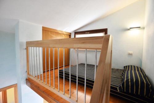 a bunk bed in a room with a staircase at Luxury Guesthouse Pula in Pula