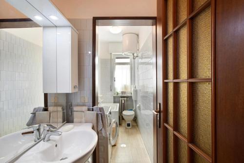 a bathroom with a sink and a toilet at Vanna House in Saint Vincent