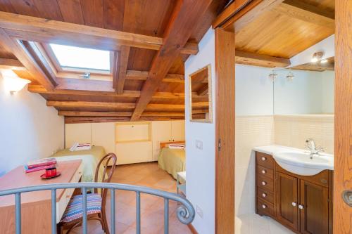 a small bathroom with a sink and a sink at Casina La Torretta - By The Walls in Lucca