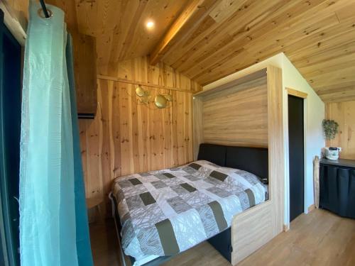 Giường trong phòng chung tại Ma cabane Océan