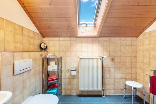 a bathroom with two sinks and a shower at Kirschenhof in Bad Bellingen