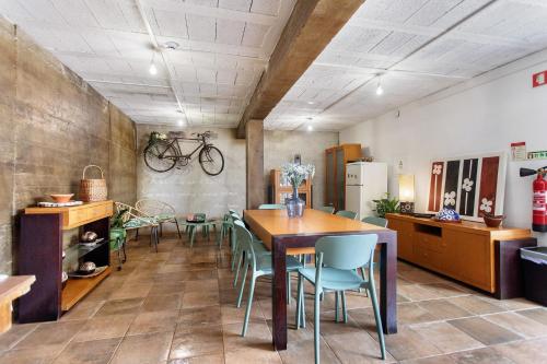 a dining room with a table and chairs at Quinta dos Raposos- Nazaré Portugal in Nazaré