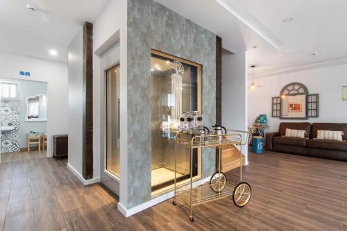 a shopping cart in a room with a living room at Quinta dos Raposos- Nazaré Portugal in Nazaré