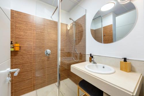 a bathroom with a sink and a shower at Golf Beach Vera in Vera