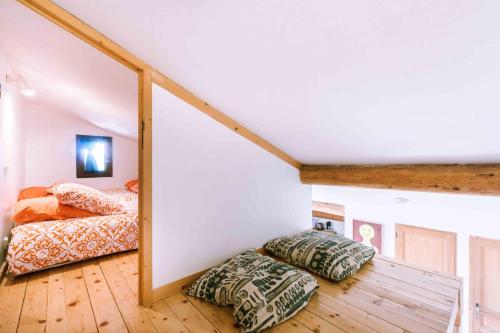 En eller flere senge i et værelse på Chalet cosy