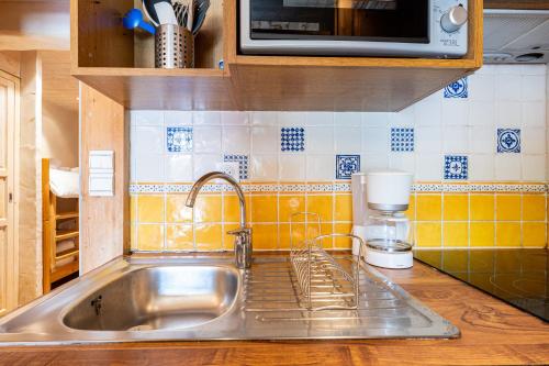Køkken eller tekøkken på Appartement Flocon