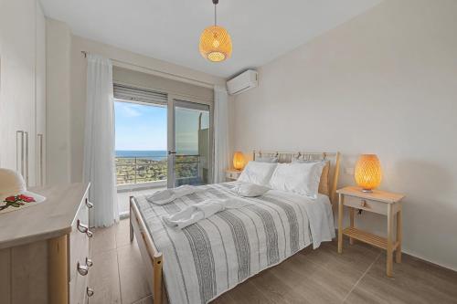 Llit o llits en una habitació de Villa Elia