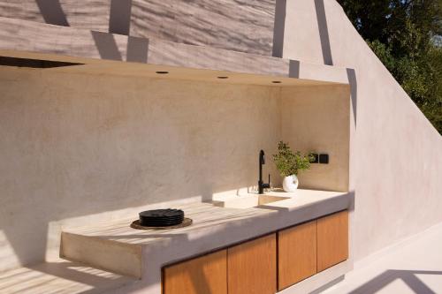 a kitchen with a sink and a counter top at Villa Alexandra in Lefkada