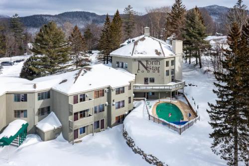 an aerial view of a house in the snow at North Star Lodge & Resort in Killington