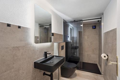 a bathroom with a sink and a toilet at Fewo Kerbe in Willingen