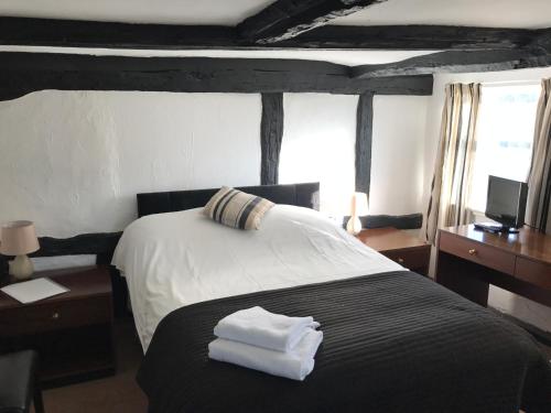 Tempat tidur dalam kamar di The Bulls Head Inkberrow