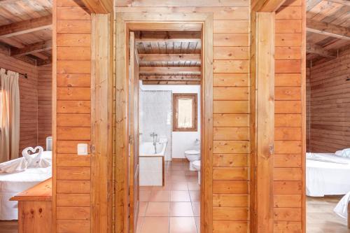 a bathroom with a toilet and a sink at Finca L'hort Nou in Pollença