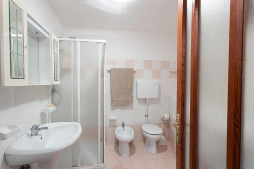 a bathroom with a sink and a toilet at Casa Rita app 4 A in Tremosine Sul Garda