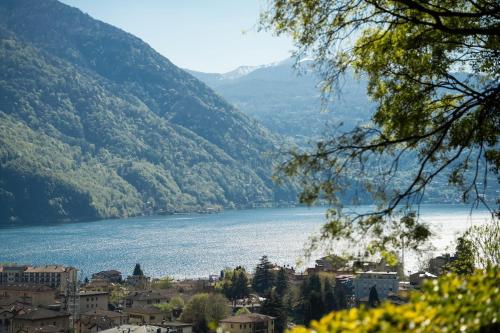 a view of a city and a lake at Begna Kiddie Paradise Poolside Retreat in Porlezza