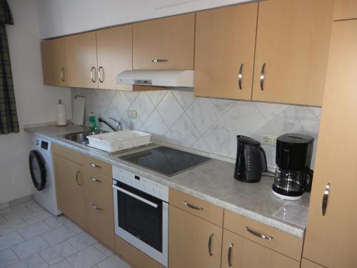 a kitchen with a sink and a counter top at Ferienwohnung Stadtblick in Bräunlingen