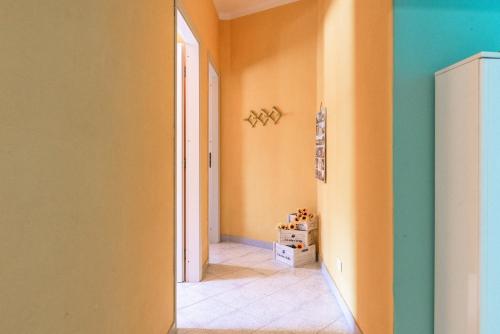 a hallway with an open door to a room at Villa Tre 's' in Montallegro