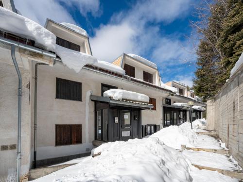 a building with snow on the ground at Apartment Richardette by Interhome in Sauze d'Oulx