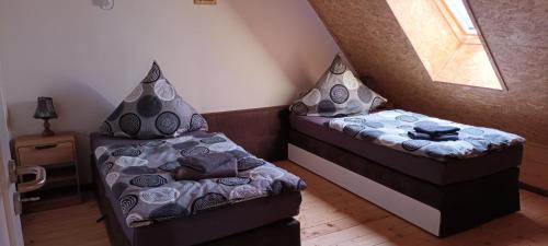 a room with two beds with ears on them at Haus beim Schloß in Woldegk
