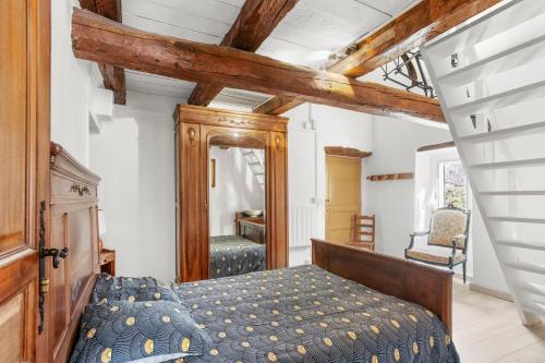 Llit o llits en una habitació de La Bastide De Queyran