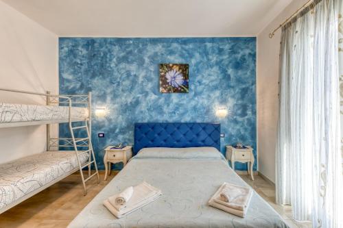 Llit o llits en una habitació de bed and breakfast Tallyho