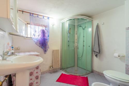 a bathroom with a shower and a sink at Villa Relax Due in Galatone