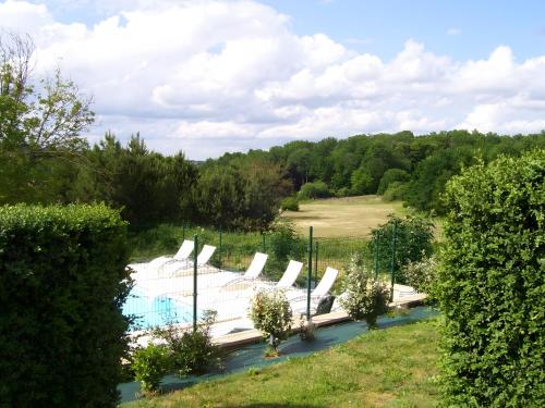 a pool in the middle of a river at Terre De Pierres - Gite Améthyste in Saint-Geniès