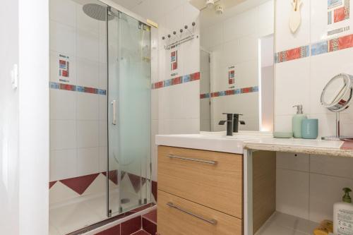 a bathroom with a shower and a sink at La Dolce Vita in Lambesc
