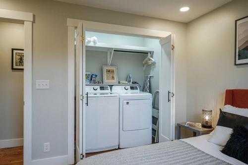 a laundry room with a washer and dryer in it at JB`s Place · JB`s Place in Brevard
