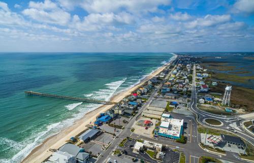 an aerial view of a beach and the ocean at Lazy Daze in Surf City