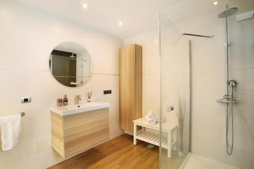 a bathroom with a sink and a shower at Villa Tauro 31 in Mogán
