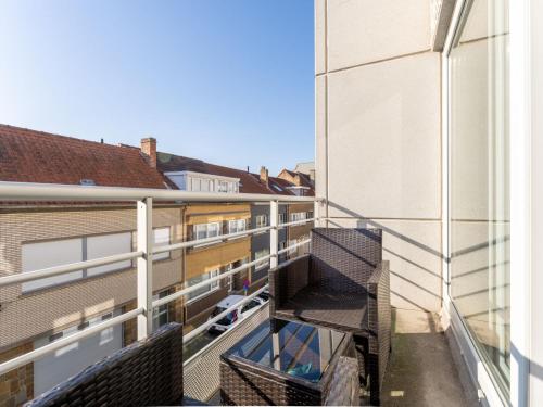 a balcony of a building with a car on it at Apartment Zandloper with balcony by Interhome in Bredene