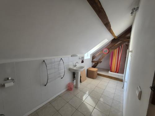 a bathroom with a sink and a shower at Maison de Vacances Chez La Prade in Salagnac