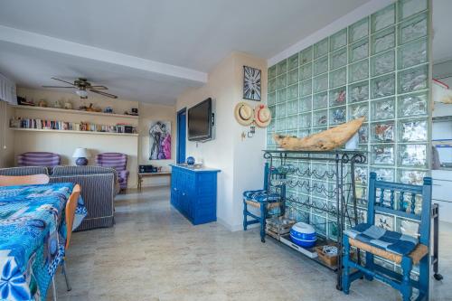 a bedroom with a bed and a room with at Maison Mer Peniscola in Peniscola