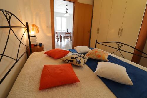 two beds with pillows on them in a bedroom at Casa Vacanze Marta in Otranto