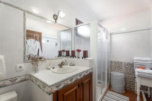 a bathroom with a sink and a shower at Villa María in Taco