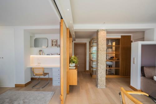 a small apartment with a bedroom and a living room at Santa Teresuca en Santander in Santander