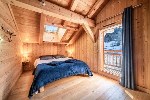 Llit o llits en una habitació de Chalet Le Mas Devant