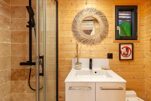 a bathroom with a sink and a shower at Bali House in Peypin