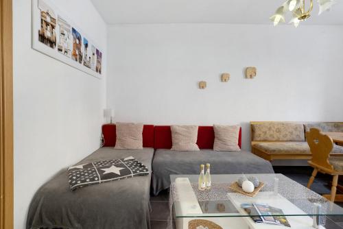 a living room with two beds and a couch at Haus Berlin Annaberg in Annaberg-Buchholz