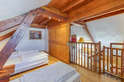 Llit o llits en una habitació de Chalet le Regain