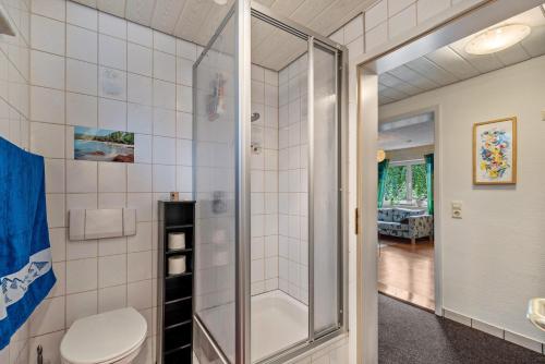 a bathroom with a shower and a toilet at Schönes Zimmer mit eigenem Bad in Albstadt